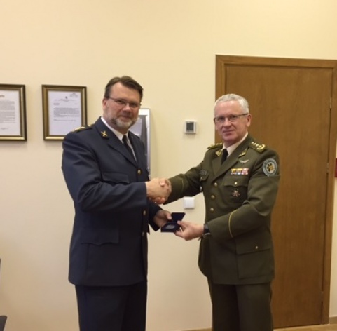 Director of the NATO ENSEC COE meeting with Swedish Defence Attaché in Vilnius