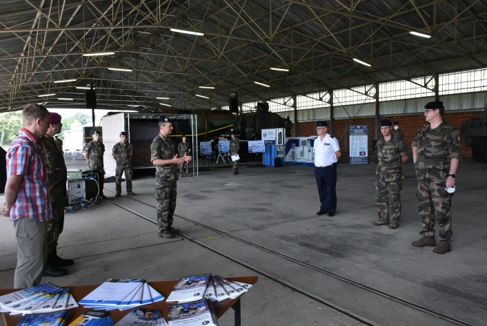 NATO ENSEC COE delegation presented the Centre in the exhibition organised by the Joint Fuel...
